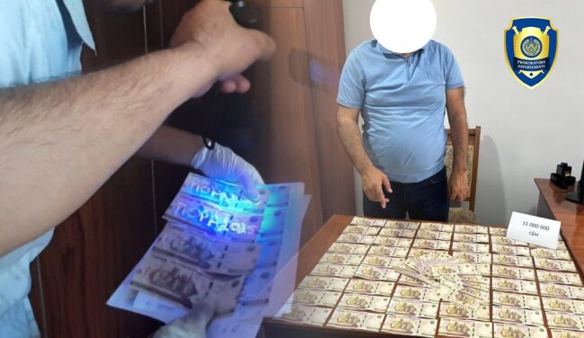Ранее судимый сотрудник «Худудий электр тармоклари» задержан в Асаке при получении 11 млн сумов