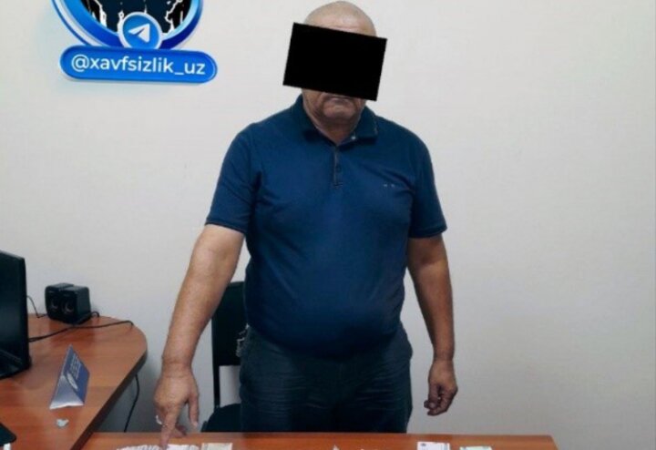 В Денау задержали адвоката при получении 60 млн сумов